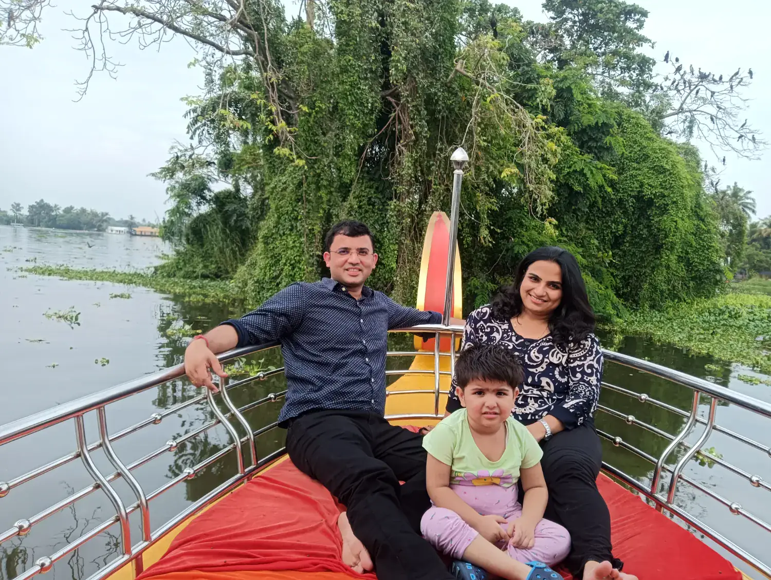 Family enjoying a private Shikara ride in Alleppey