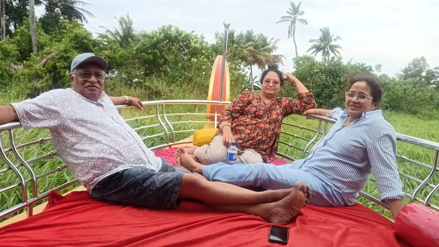 Older guests relaxing comfortably on a private Shikara