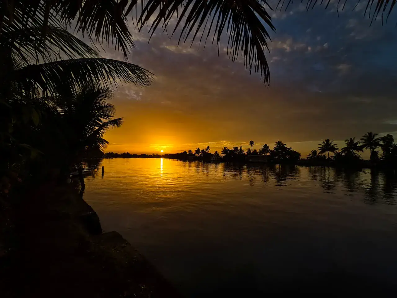 Sunset reflected across the Alleppey backwaters