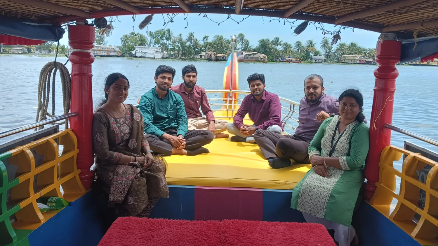 A family group enjoying a client Shikara cruise